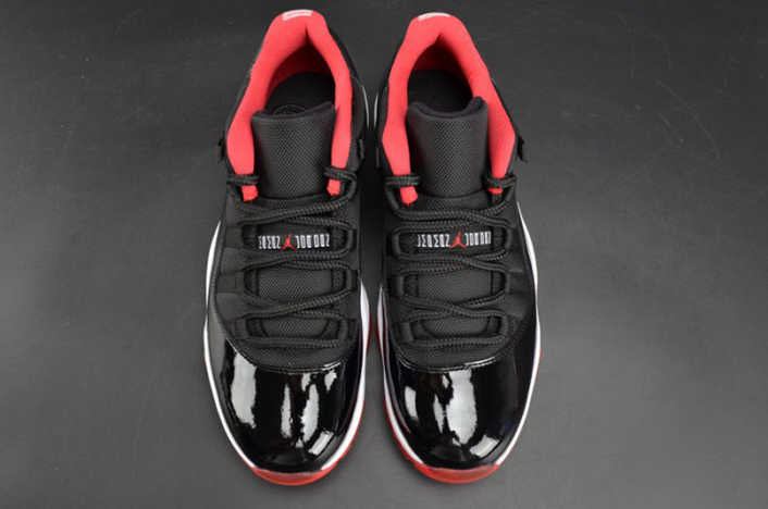 air jordan 11 retro low "bred" black/ red mens 528895-012